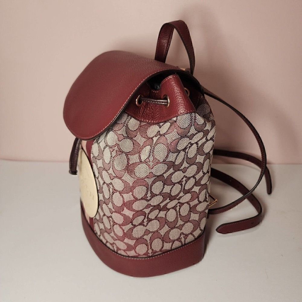 NWT Coach CE601 Dempsey Drawstring Backpack In Signature Jacquard Wine - Picture 2 of 8